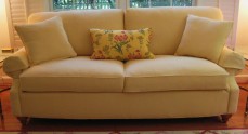 Lido Sofa in yellow diamond pattern mattelasse' cotton, with throw pillow in yellow floral Hollanda linen