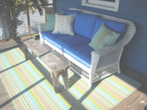Whitecraft Outdoor Wicker Sofa with Dash and Albert Rug and Pillows Whitecraft Outdoor Wicker Sofa with Dash and Albert Rug and Pillows