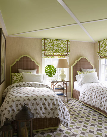 Ikat Fabric from China Seas jazzes up a bedroom by  , courtesy of House Beautiful.