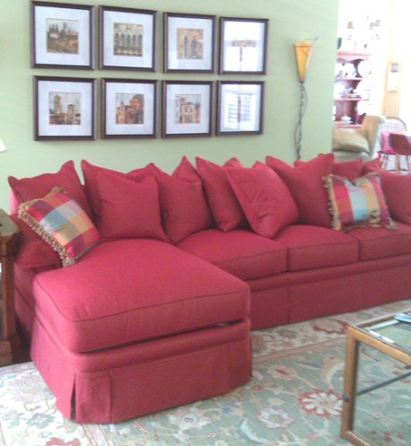 This scatterback sectional has two pieces: a full-length sofa and chaise end.
